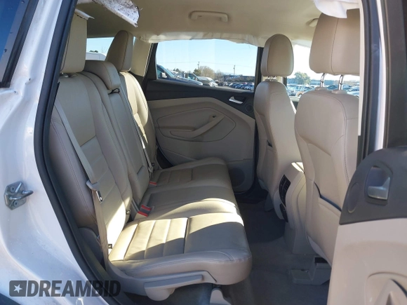 2016 Ford Escape SE with VIN 1FMCU9GX2GUB29249, listed as a IAAI auction lot 41545211 with 97,631 mi miles. Bid and sale history available at carsss.com. Image 8.