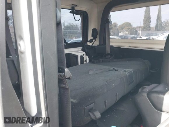 2018 Jeep Wrangler Sport S with VIN 1C4GJXAG0JW173936, listed as a IAAI auction lot 41070756 with Not Provided miles and . Bid and sale history available at DreamBid. Image 8.