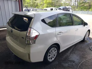 2014 Toyota Prius Two with VIN JTDZN3EU7EJ013979, listed as a IAAI auction lot 42105528 with 203,589 mi miles and . Bid and sale history available at DreamBid. Image 4.