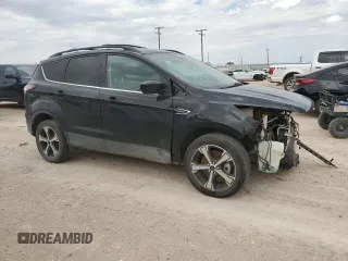 2017 Ford Escape SE with VIN 1FMCU9G93HUB66829, listed as a Copart auction lot 69093414 with 99,569 mi miles and Salvage Title. Bid and sale history available at carsss.com. Image 4.