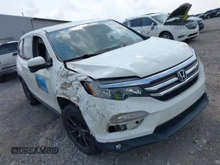 2018 Honda Pilot EX-L with VIN 5FNYF6H52JB063429, listed as a IAAI auction lot 42285436 with 89,429 mi miles and . Bid and sale history available at DreamBid. Image 1.