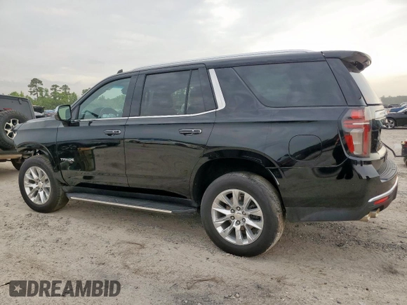 2023 Chevrolet Tahoe Premier with VIN 1GNSCSKD6PR520373, listed as a Copart auction lot 60642175 with Not provided miles and Salvage title. Bid and sale history available at DreamBid. Image 2.