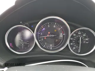 2021 Mazda MX-5 Miata Sport с VIN JM1NDAB78M0454772, выставлен на аукционе Copart как лот 63319665 с пробегом 58 373 миль миль и Списание • Salvage title. История ставок и продаж доступна на DreamBid. Изображение 9.