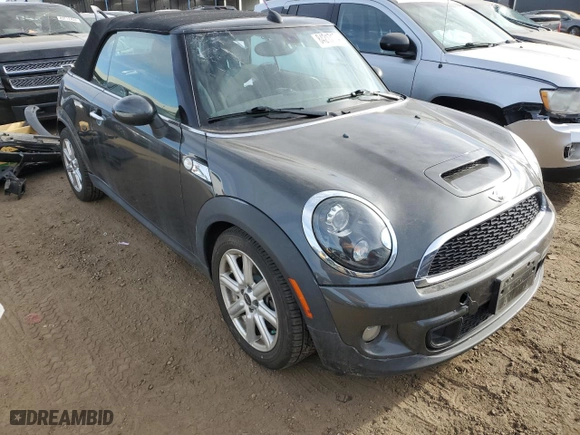 2011 MINI Cooper Convertible s with VIN WMWZP3C52BTX83901, listed as a Copart auction lot 84217174 with 82,831 mi miles and Salvage Title. Bid and sale history available at carsss.com. Image 4.