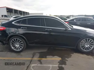 2019 Mercedes-Benz GLC 300 with VIN WDC0J4KB0KF667213, listed as a IAAI auction lot 40422288 with 56,488 mi miles and . Bid and sale history available at DreamBid. Image 13.