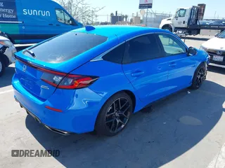 2024 Honda Civic Sport Touring z VIN 19XFL1G85RE026665, wystawiony jako IAAI lot #41735645 z przebiegiem 5025 mil mil oraz . Historia ofert i sprzedaży dostępna na DreamBid. Obrazek 4.
