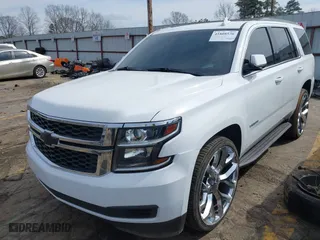 2019 Chevrolet Tahoe LT with VIN 1GNSCBKC6KR345154, listed as a IAAI auction lot 41808536 with 124,325 mi miles. Bid and sale history available at carsss.com. Image 2.
