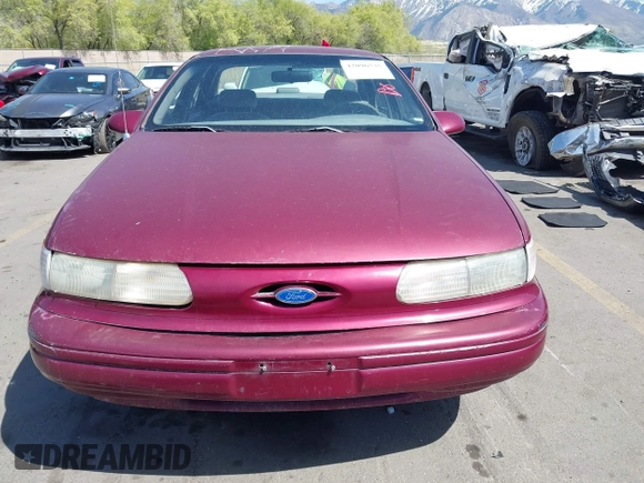 1993 Ford Taurus z VIN 1FACP52U4PG225521, wystawiony jako IAAI lot #42096535 z przebiegiem 76 808 mil mil oraz . Historia ofert i sprzedaży dostępna na DreamBid. Obrazek 12.