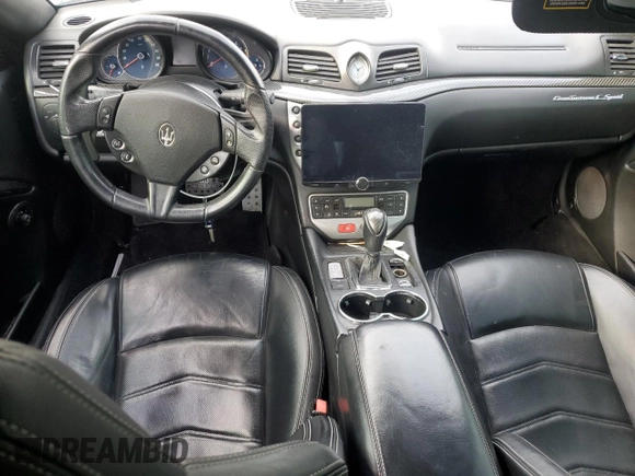 2014 Maserati GranTurismo Sport z VIN ZAM45VMAXE0088951, wystawiony jako Copart lot #78580054 z przebiegiem 72 970 mil mil oraz Szkoda całkowita • Salvage title. Historia ofert i sprzedaży dostępna na DreamBid. Obrazek 8.