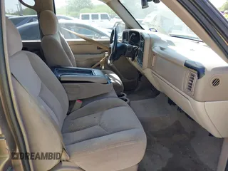 2004 Chevrolet Suburban LT with VIN 1GNEC16Z64J117498, listed as a IAAI auction lot 42005973 with 246,938 mi miles. Bid and sale history available at carsss.com. Image 5.