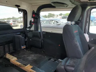2020 Jeep Wrangler Rubicon z VIN 1C4HJXCG6LW242469, wystawiony jako Copart lot #56965025 z przebiegiem Nie podano mil oraz Szkoda całkowita • Salvage title. Historia ofert i sprzedaży dostępna na DreamBid. Obrazek 10.