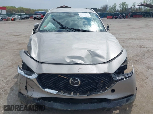2022 Mazda CX-30 S Select z VIN 3MVDMBBL2NM439681, wystawiony jako IAAI lot #41960902 z przebiegiem 22 730 mil mil oraz . Historia ofert i sprzedaży dostępna na DreamBid. Obrazek 12.