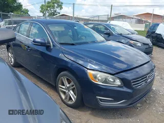 2014 Volvo S60 T5 with VIN YV1612FS6E1292616, listed as a IAAI auction lot 42753171 with 123,088 mi miles and . Bid and sale history available at DreamBid. Image 1.
