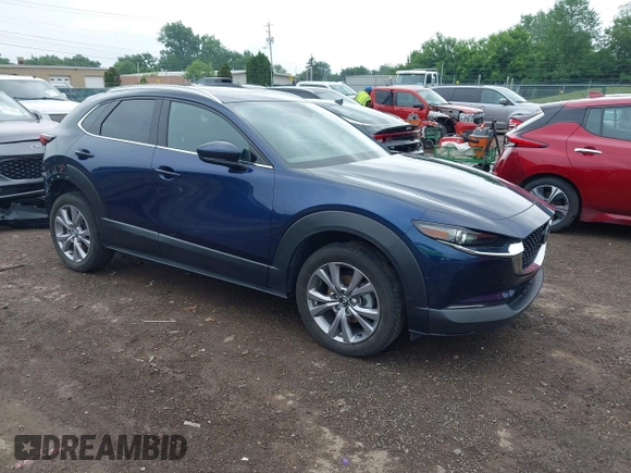 2022 Mazda CX-30 S Premium with VIN 3MVDMBDL0NM413545, listed as a IAAI auction lot 42493594 with 57,013 mi miles and . Bid and sale history available at DreamBid. Image 1.