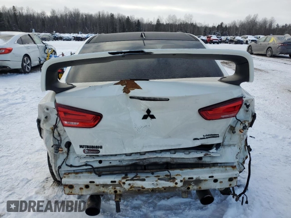 2010 Mitsubishi Lancer Evolution GSR with VIN JA32W8FV4AU604717, listed as a Copart auction lot 83896464 with 140,502 mi miles and Salvage Title. Bid and sale history available at DreamBid. Image 6.