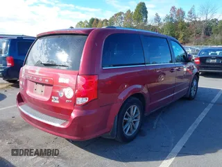 2014 Dodge Grand Caravan SXT with VIN 2C4RDGCG8ER311850, listed as a IAAI auction lot 40598088 with 138,010 mi miles and . Bid and sale history available at DreamBid. Image 4.
