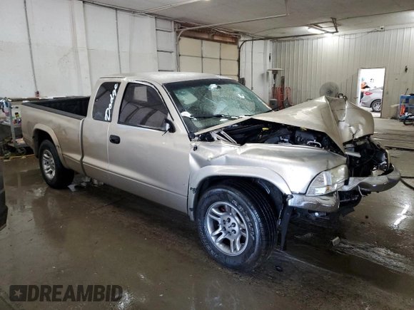 2003 Dodge Dakota SLT z VIN 1D7HL42N63S132141, wystawiony jako Copart lot #56138235 z przebiegiem 219 246 mil mil oraz Szkoda całkowita • Salvage title. Historia ofert i sprzedaży dostępna na DreamBid. Obrazek 4.