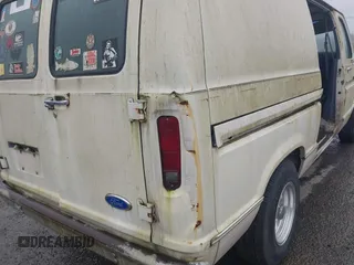 1990 Ford Econoline Cargo with VIN 1FTDE14N0LHA80405, listed as a IAAI auction lot 41824747 with 91,278 mi miles and . Bid and sale history available at DreamBid. Image 6.