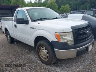 2014 Ford F-150 XL with VIN 1FTMF1CM4EKF51645, listed as a IAAI auction lot 42604754 with 296,903 mi miles and . Bid and sale history available at DreamBid. Image 1.