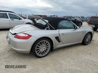 2007 Porsche Boxster S z VIN WP0CB29857U730730, wystawiony jako Copart lot #74175794 z przebiegiem Nie podano mil oraz Szkoda całkowita • Salvage title. Historia ofert i sprzedaży dostępna na DreamBid. Obrazek 3.