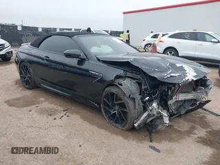 2014 BMW M6 z VIN WBSLZ9C58ED651156, wystawiony jako IAAI lot #41526192 z przebiegiem 90 642 mil mil oraz . Historia ofert i sprzedaży dostępna na DreamBid. Obrazek 1.