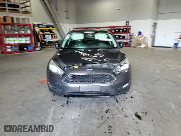 2016 Ford Focus SE z VIN 1FADP3F27GL216059, wystawiony jako Copart lot #59611395 z przebiegiem 170 468 mil mil oraz Szkoda całkowita • Salvage title. Historia ofert i sprzedaży dostępna na DreamBid. Obrazek 13.
