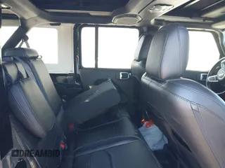 2021 Jeep Wrangler Unlimited Sahara z VIN 1C4JJXP68MW863698, wystawiony jako IAAI lot #41615738 z przebiegiem Nie podano mil oraz . Historia ofert i sprzedaży dostępna na DreamBid. Obrazek 8.
