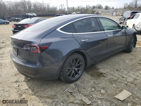 2019 Tesla Model 3 Mid Range with VIN 5YJ3E1EA0KF400330, listed as a Copart auction lot 44907585 with 38,590 mi miles and Salvage Title. Bid and sale history available at carsss.com. Image 3.