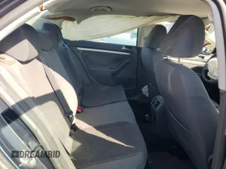 2009 Volkswagen Jetta S с VIN 3VWJM71K69M012386, выставлен на аукционе Copart как лот 52616555 с пробегом 150 322 миль миль и Списание • Salvage title. История ставок и продаж доступна на DreamBid. Изображение 10.