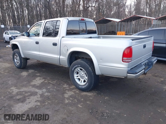 2002 Dodge Dakota Sport with VIN 1B7HG38N12S661043, listed as a IAAI auction lot 41552725 with 206,662 mi miles. Bid and sale history available at carsss.com. Image 3.
