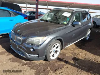 2013 BMW X1 28i with VIN WBAVM1C57DVW42096, listed as a IAAI auction lot 41572971 with 156,999 mi miles. Bid and sale history available at carsss.com. Image 16.