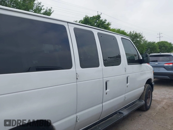 2014 Ford Econoline Passenger XL with VIN 1FBNE3BL7EDA33078, listed as a IAAI auction lot 41938472 with 191,745 mi miles. Bid and sale history available at carsss.com. Image 13.