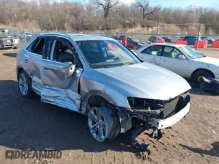 2018 Audi Q3 Premium Plus with VIN WA1JCCFS4JR030776, listed as a IAAI auction lot 41709645 with 73,953 mi miles. Bid and sale history available at carsss.com. Image 1.