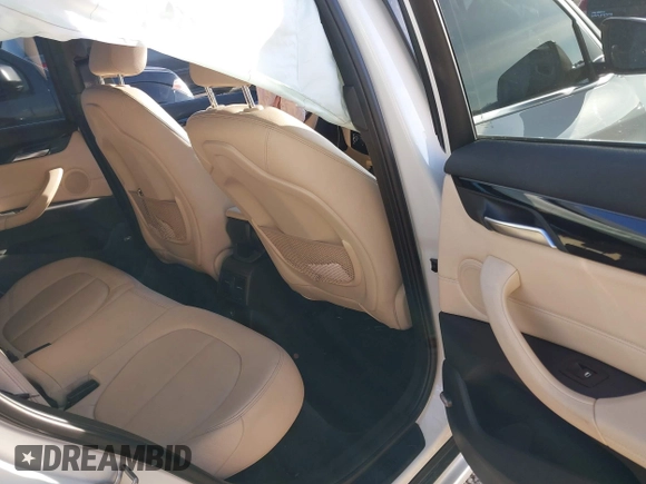 2018 BMW X1 sDrive28i with VIN WBXHU7C36J5H41267, listed as a IAAI auction lot 41270207 with 84,726 mi miles. Bid and sale history available at carsss.com. Image 8.