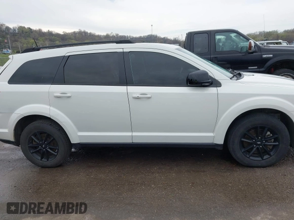 2019 Dodge Journey SE with VIN 3C4PDCBB1KT845643, listed as a IAAI auction lot 41877311 with 85,824 mi miles and . Bid and sale history available at DreamBid. Image 14.