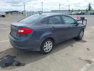 2013 Ford Fiesta SE z VIN 3FADP4BJ3DM186569, wystawiony jako IAAI lot #42128913 z przebiegiem 19 228 mil mil oraz . Historia ofert i sprzedaży dostępna na DreamBid. Obrazek 4.