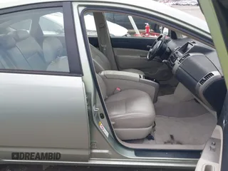 2006 Toyota Prius z VIN JTDKB20U963131145, wystawiony jako IAAI lot #41857847 z przebiegiem 113 251 mil mil oraz . Historia ofert i sprzedaży dostępna na DreamBid. Obrazek 5.