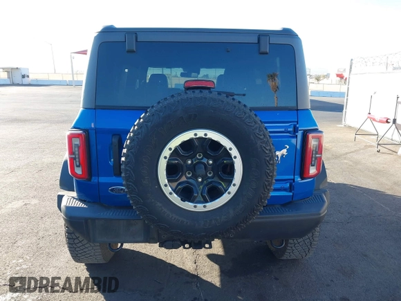 2022 Ford Bronco z VIN 1FMEE5DPXNLB37346, wystawiony jako IAAI lot #41346731 z przebiegiem 20 709 mil mil oraz . Historia ofert i sprzedaży dostępna na DreamBid. Obrazek 17.