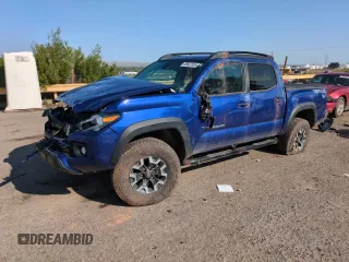 2023 Toyota Tacoma SR with VIN 3TMCZ5AN6PM578945, listed as a Copart auction lot 59637355 with 14,688 mi miles and Salvage title. Bid and sale history available at DreamBid. Image 1.