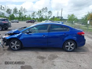 2018 Kia Forte LX with VIN 3KPFL4A77JE281839, listed as a IAAI auction lot 42012006 with 134,675 mi miles and . Bid and sale history available at DreamBid. Image 14.