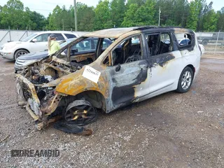 2020 Chrysler Pacifica Touring L with VIN 2C4RC1BG2LR115935, listed as a IAAI auction lot 42244837 with Not provided miles and . Bid and sale history available at DreamBid. Image 2.