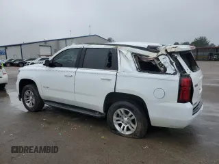 2020 Chevrolet Tahoe LT with VIN 1GNSKBKC1LR230885, listed as a Copart auction lot 46532275 with 103,900 mi miles and Salvage title. Bid and sale history available at DreamBid. Image 2.
