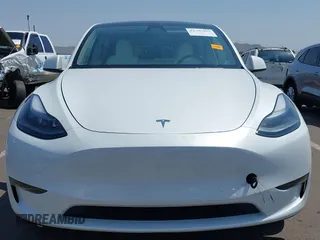 2024 Tesla Model Y with VIN 7SAYGDED8RF201955, listed as a IAAI auction lot 42700483 with 11,898 mi miles and . Bid and sale history available at DreamBid. Image 13.