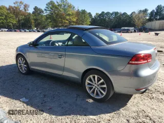 2015 Volkswagen Eos Komfort with VIN WVWBW8AH3FV000614, listed as a Copart auction lot 76080904 with 75,202 mi miles and Clean Title. Bid and sale history available at DreamBid. Image 2.