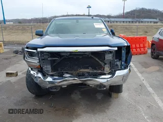 2016 Chevrolet Silverado 1500 LT with VIN 3GCUKRECXGG359705, listed as a IAAI auction lot 41644633 with 157,957 mi miles and . Bid and sale history available at DreamBid. Image 13.