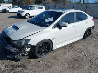 2015 Subaru WRX Premium with VIN JF1VA1D64F9814394, listed as a IAAI auction lot 41844272 with 118,415 mi miles. Bid and sale history available at carsss.com. Image 2.