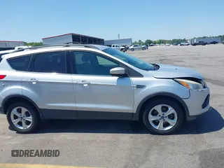 2013 Ford Escape SE with VIN 1FMCU0GX0DUA19811, listed as a IAAI auction lot 42009015 with 135,662 mi miles. Bid and sale history available at carsss.com. Image 13.
