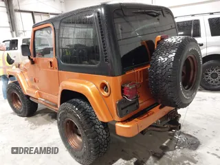 1998 Jeep Wrangler Sahara z VIN 1J4FY49S1WP802940, wystawiony jako IAAI lot #41433820 z przebiegiem 122 180 mil mil oraz . Historia ofert i sprzedaży dostępna na DreamBid. Obrazek 3.