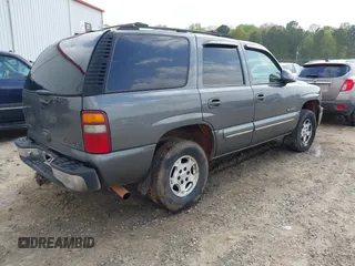 2002 Chevrolet Tahoe LT z VIN 1GNEK13Z42J203185, wystawiony jako IAAI lot #41940552 z przebiegiem 325 618 mil mil oraz . Historia ofert i sprzedaży dostępna na DreamBid. Obrazek 4.