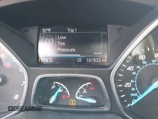 2016 Ford Escape SE z VIN 1FMCU9GX3GUB85250, wystawiony jako IAAI lot #42322056 z przebiegiem 187 833 mil mil oraz . Historia ofert i sprzedaży dostępna na DreamBid. Obrazek 7.